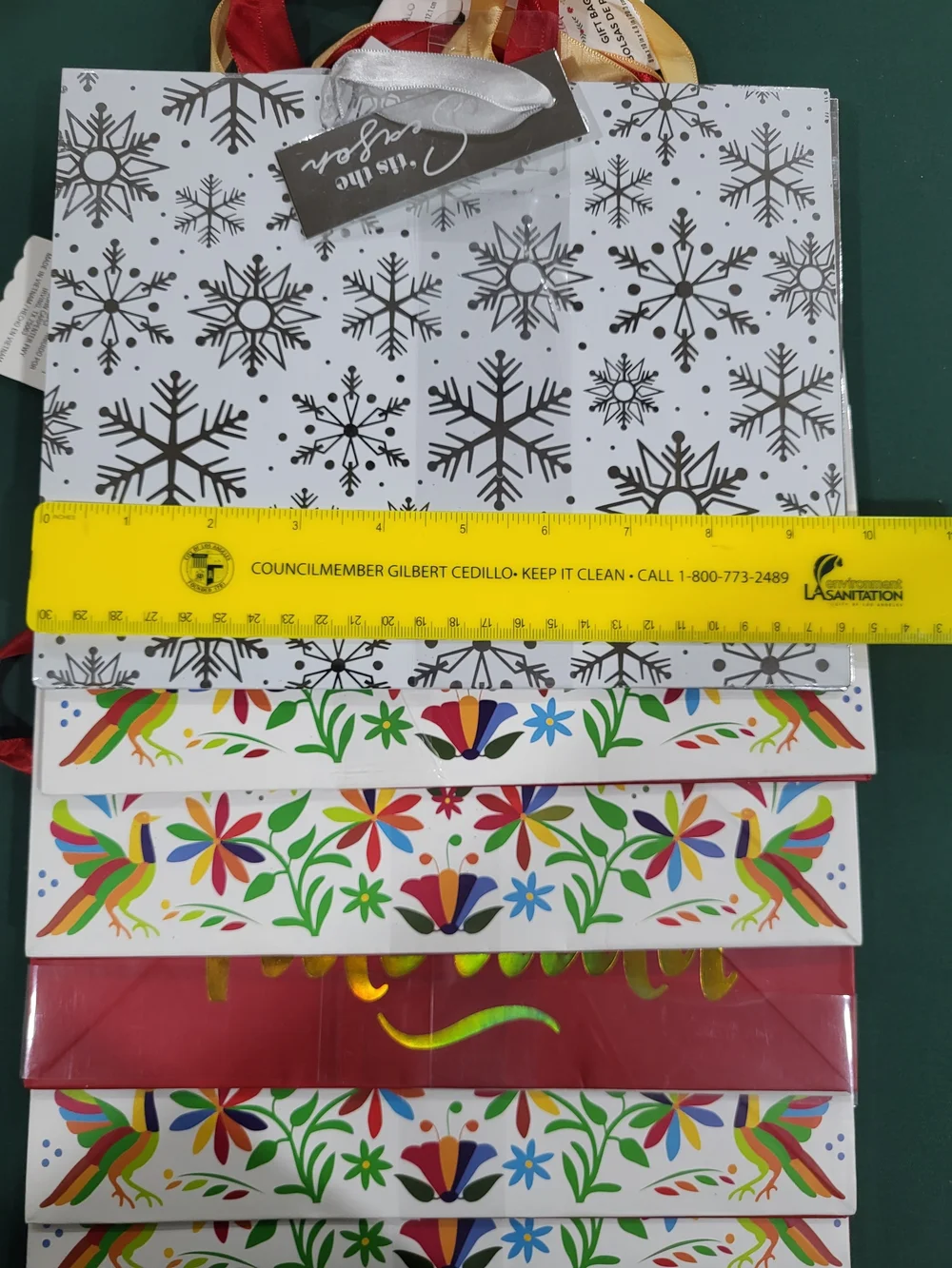 Holiday Time Feliz Navidad Red and Gold Gift Bags with Colorful Folk Art
